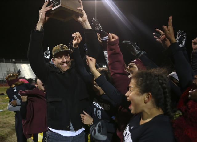 Cimarron-Memorial head coach Mark Bailey celebrates his team’s victory in last year&#8 ...