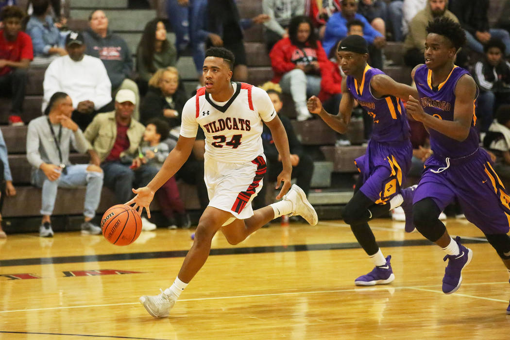 Las Vegas player Zach Matlock (24) brings the ball up the court during a game against Durang ...