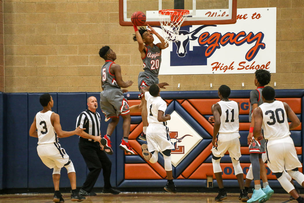 Arbor View’s Comillion Smith (20) shoots the ball against Democracy Prep during the fi ...