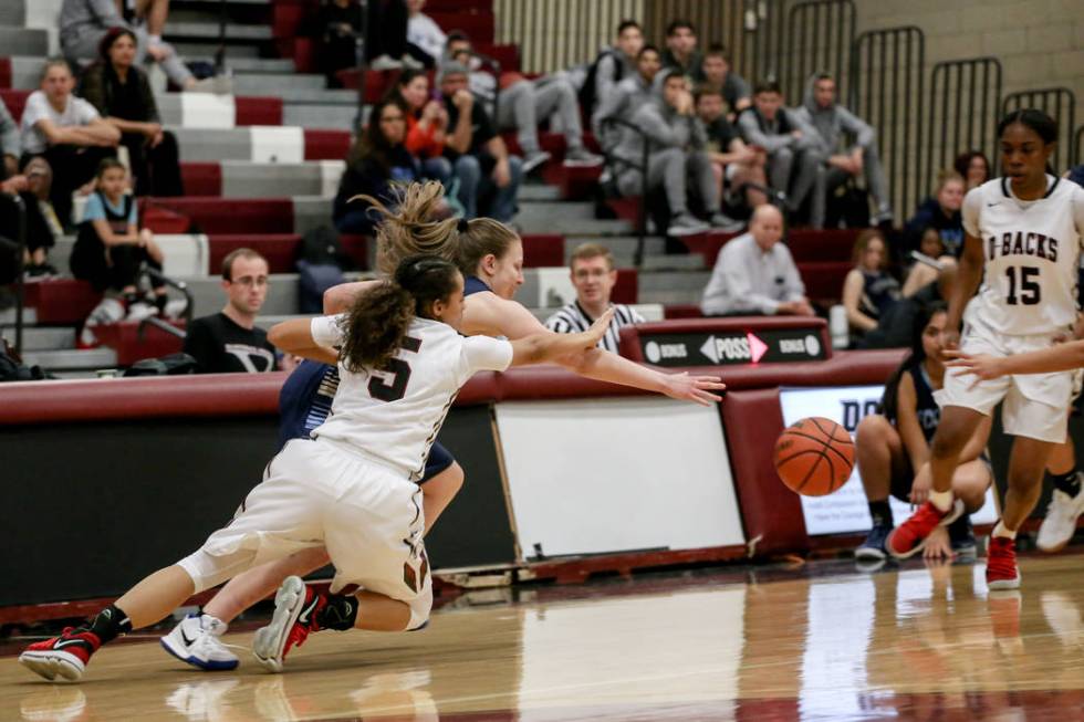 Desert Oasis’ Eliyjah Pricebrooks (5), left, and Foothill’s Kaylee Hall (11), ce ...