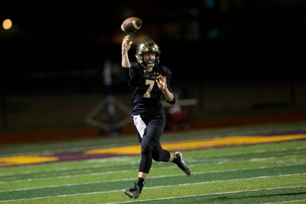 Faith Lutheran’s quarterback Sagan Gronauer (7) throws a pass against Green Valley in ...