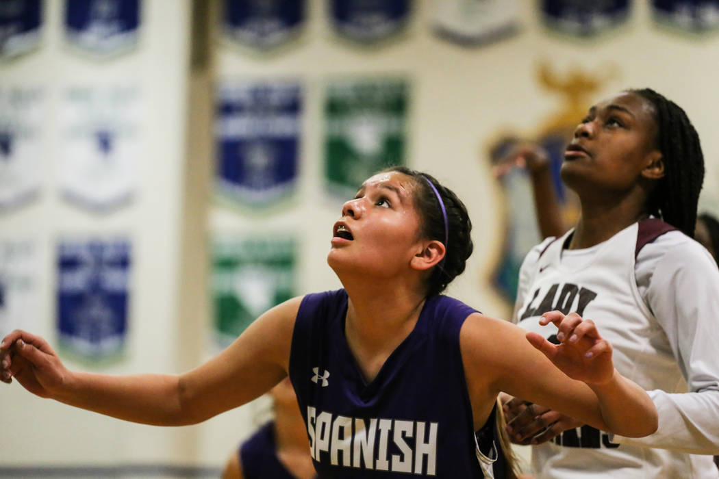 Spanish Springs’ Lauryn Dressler (20), left, and Cimarron-Memorial’s Amoura Whit ...