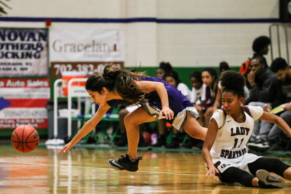 Cimarron-Memorial’s Mary-Jane Williams-Law (11) watches as Spanish Springs’ Nael ...