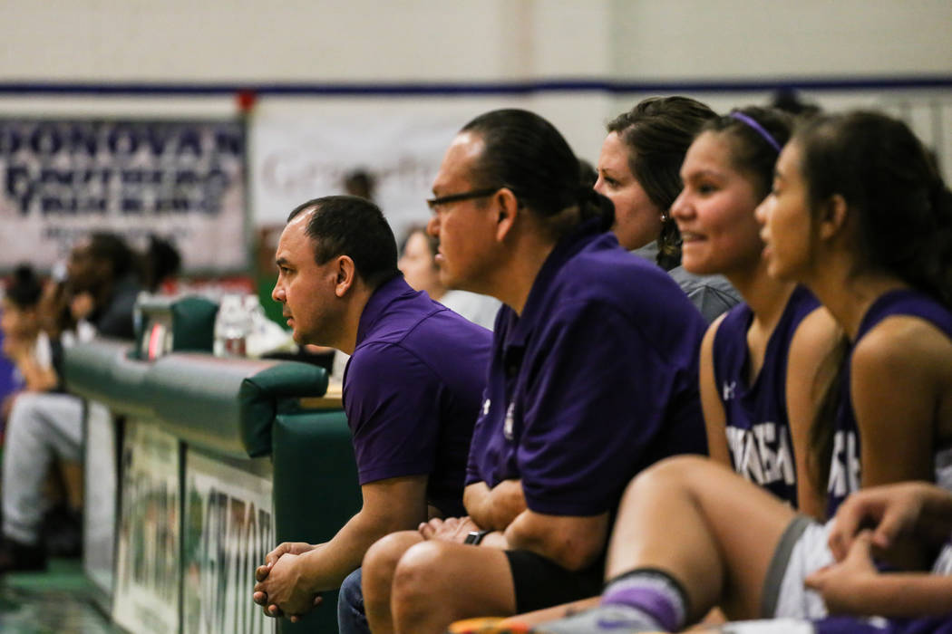 Spanish Springs head coach Arturo Cardenas, left, watches the fourth quarter of a basketball ...