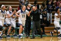 Spring Valley’s Natalie Meredith (33) and Spring Valley head coach Billy Hemberger ce ...