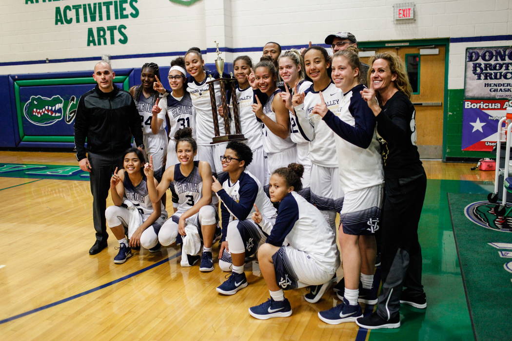 Spring Valley gathers after defeating Liberty 67-65 in the diamond bracket championship bask ...