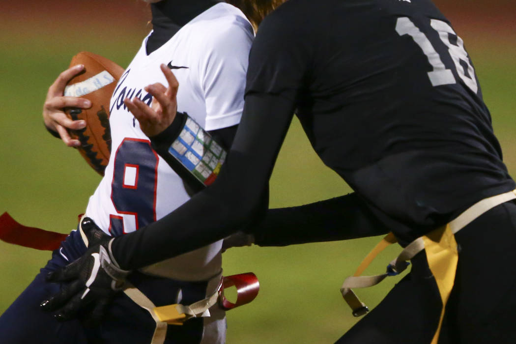 Cimarron-Memorial’s Haylie Hughes (18) tags out Coronado’s Caitlin Shannon (9) d ...