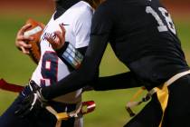 Cimarron-Memorial’s Haylie Hughes (18) tags out Coronado’s Caitlin Shannon (9) d ...