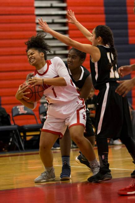 Liberty’s Jahnae Nickels (1) is pressured against Bonita Vista in the girl’s bas ...