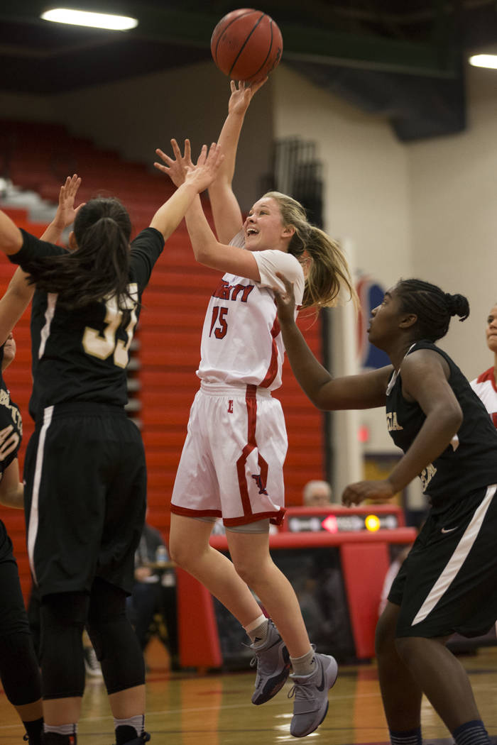 Liberty’s London Pavlica (44) goes up for a shot against Bonita Vista in the girl&#821 ...