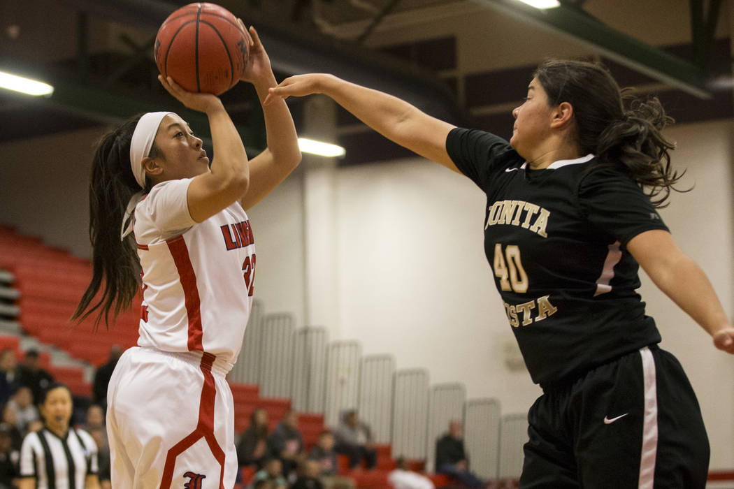 Liberty’s Tedra Tovia (32) goes up for a shot against Bonita Vista in the girl’s ...