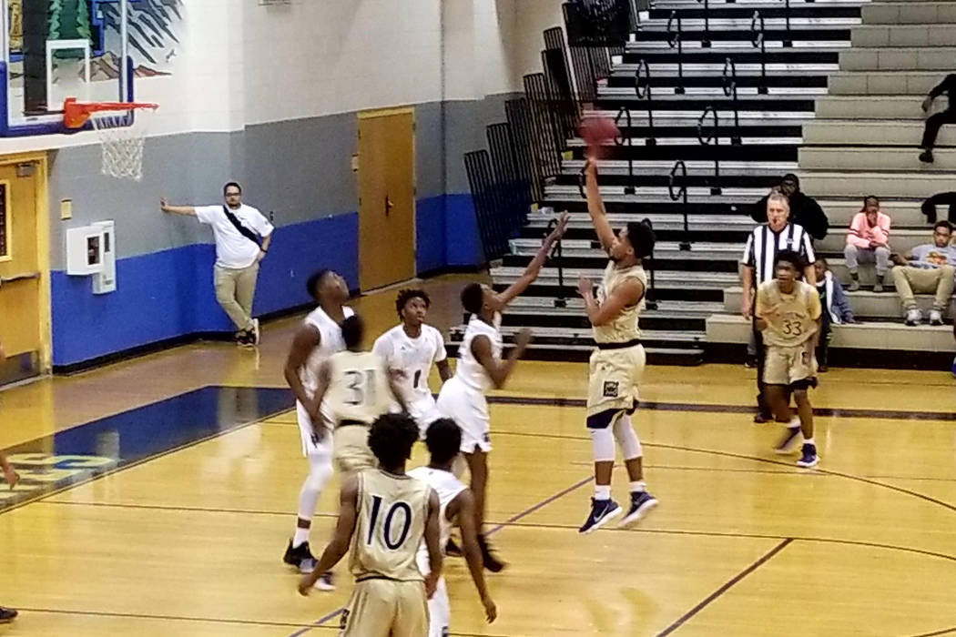 Cheyenne’s Damion Bonty takes a shot in the lane at Desert Pines High School on Tuesda ...