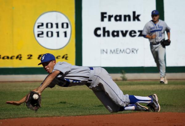 Sierra Vista second baseman Caeden Marin dives to prevent a Rancho hit.