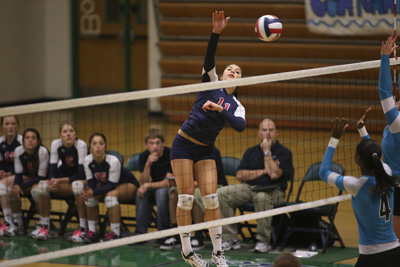 Coronado High School volleyball player Carolyn Andrulis (11) spikes the ball during a game a ...
