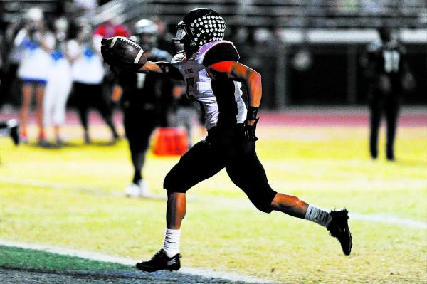 Las Vegas running back  Andrew Moreland (5) strolls into the end zone for a touchdown o ...