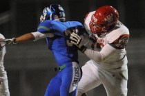 rbor View linebacker Keenen King (72) blocks Green Valley cornerback Avery Fleharty in the f ...