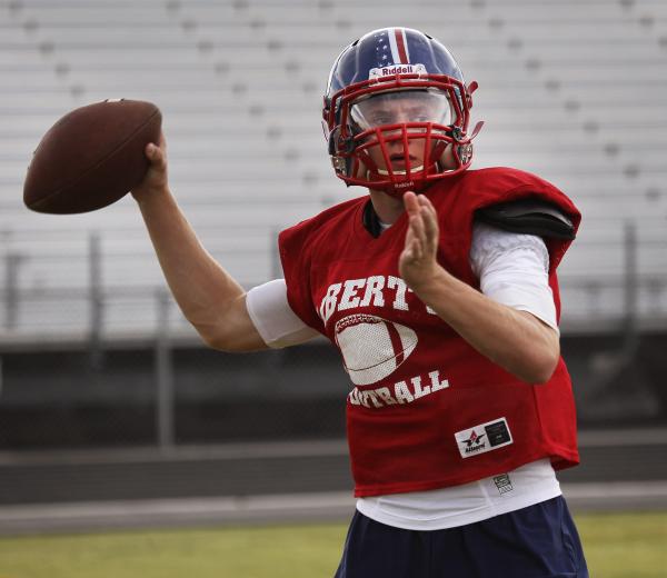 Liberty quarterback Tyler Newman prepares to throw