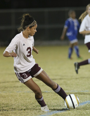 Pahrump Valley High School soccer player Lexi Smith turns around the ball during a game agai ...