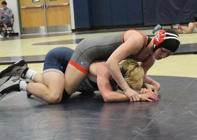 Bishop Gorman‘s Allison Petix works on top of Shadow Ridge‘s David Word during t ...