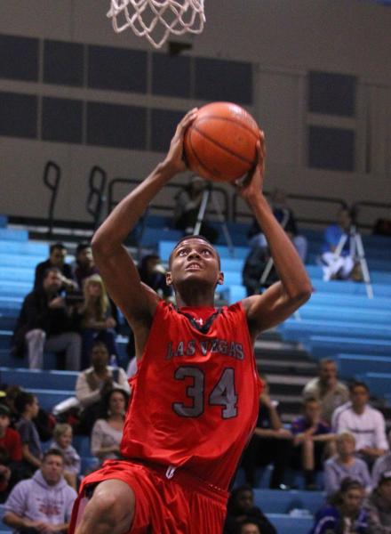 Las Vegas’ Re’Kwon Smith (34) goes up for a dunk on Tuesday. Smith had 21 points ...