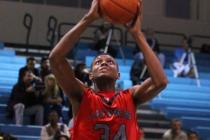 Las Vegas’ Re’Kwon Smith (34) goes up for a dunk on Tuesday. Smith had 21 points ...