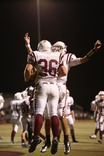 Desert Oasis fullback Blake Kutz celebrates his 4-yard touchdown run in the first quarter on ...