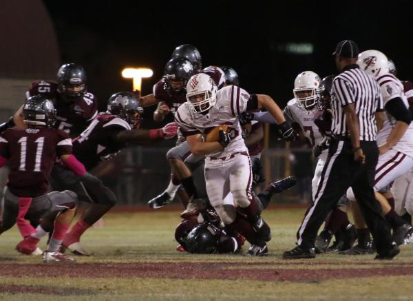 Desert Oasis fullback Blake Kutz rushes the football in the second quarter on Friday against ...