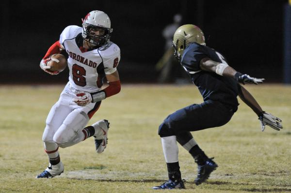 Foothill’s Cory Fisher, right, looks to make a play on Coronado’s Travis Boman o ...