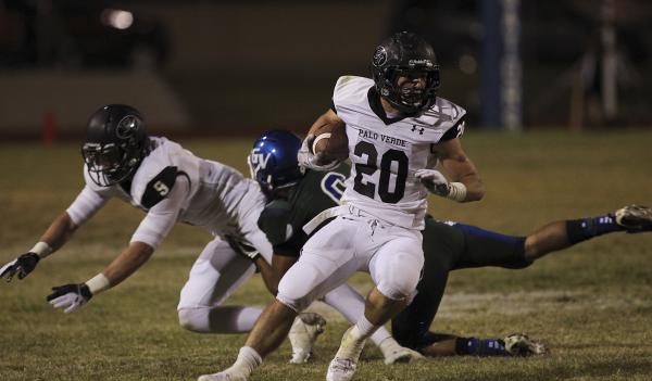 Palo Verde’s Sean Dennis (20) breaks free for a long run against Green Valley on Frida ...