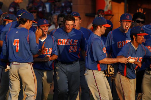 Bishop Gorman players celebrate after beating Bonanza 10-1 in a Division I state semifinal F ...