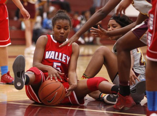 Valley’s Kennedy Wharton (5) tries to control the ball as Eldorado’s Cecilley Ha ...