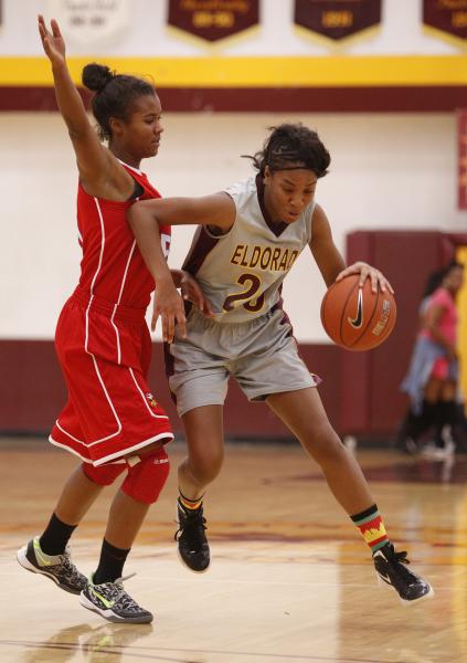 Eldorado’s DeNisheun Jackson, right, tries to drive around Valley’s Kennedy Whar ...