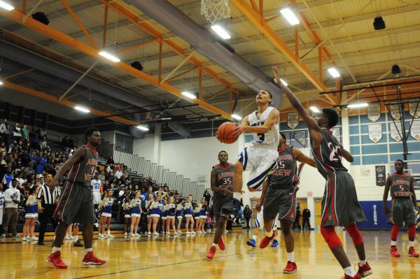 Virgin Valley’s Rich Martinez (33) makes a pass over Chaparral’s Marc Silas (3), ...