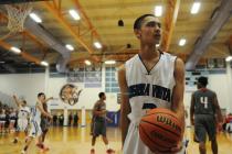 Virgin Valley’s Garrett Leavitt (20) beats Chaparral’s Tyree McNeal (35) to the ...