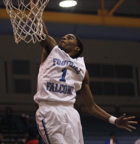 Foothill’s Jalen Shepard (1) dunks against Desert Pines on Thursday. Shepard had 11 po ...