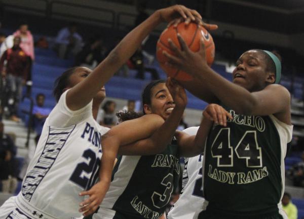 Rancho’s LaKissa Martin (44) and Miyah Wilson (3) battle Canyon Springs’ Alexia ...