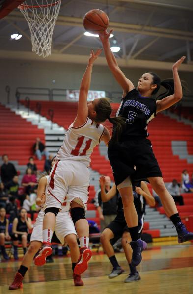 Durango’s Jazmin Chavez (5) blocks a shot by Arbor View’s Kelsey Rasore on Tuesd ...