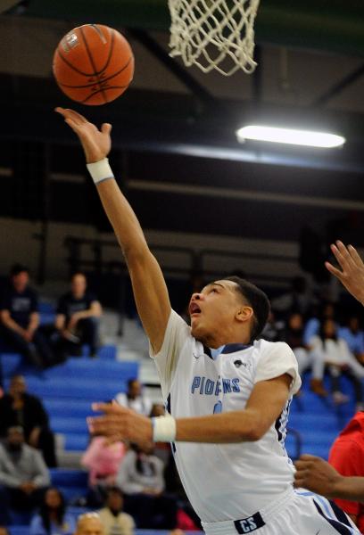 Canyon Springs’ Jordan Davis lays up the ball against Las Vegas High on Wednesday.