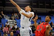 Canyon Springs’ Jordan Davis (3) lays up the ball against Las Vegas’ Re’Kw ...