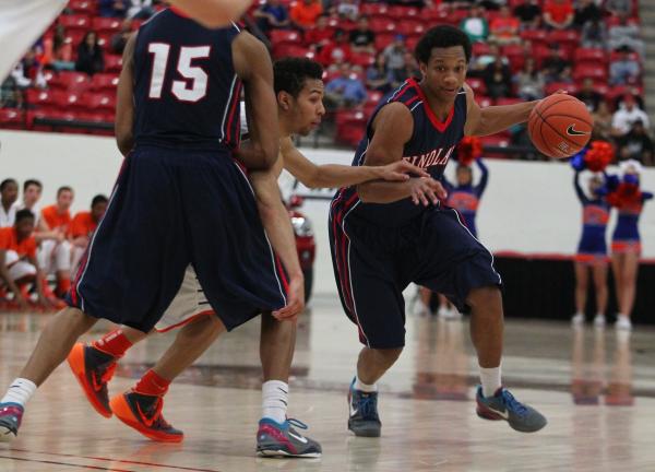 Findlay Prep’s Rashad Vaughn (1) gets a pick from teammate Justin Jackson (15) and dri ...