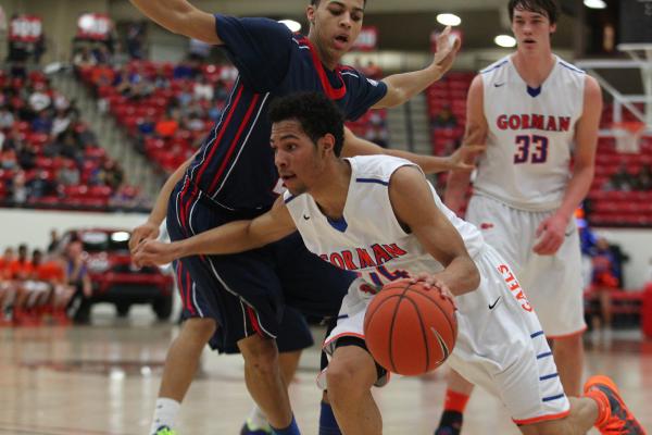 Bishop Gorman’s Noah Robotham (14) pushes through Findlay Prep’s Derryck Thornto ...