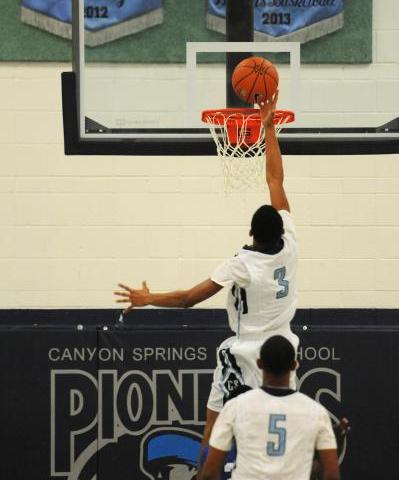 Canyon Springs’ Jordan Davis goes in for a layup on Thursday against Desert Pines. Dav ...