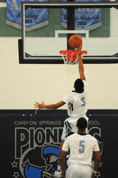 Canyon Springs’ Jordan Davis goes in for a layup on Thursday against Desert Pines. Dav ...