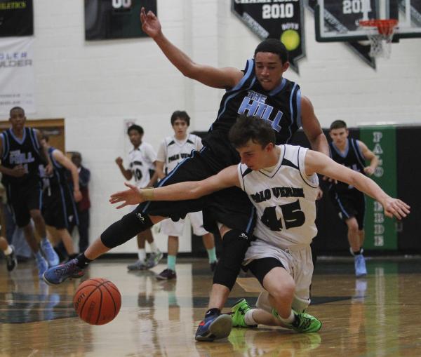 Palo Verde’s Nick Cavaleri (45) battles Foothill’s Austin Starr (30) for a loose ...