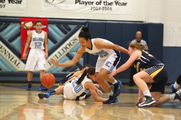 Centennial’s Karina Brandon (25) gains control of a loose ball over El Segundo’s ...