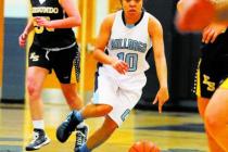 Centennial guard Tramina Jordan weaves between El Segundo (Calif.) defenders on Friday. Jord ...