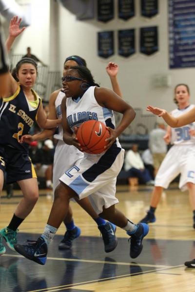 Centennial’s Tanjanea Wells (00) looks to shoot against El Segundo (Calif.) on Friday.