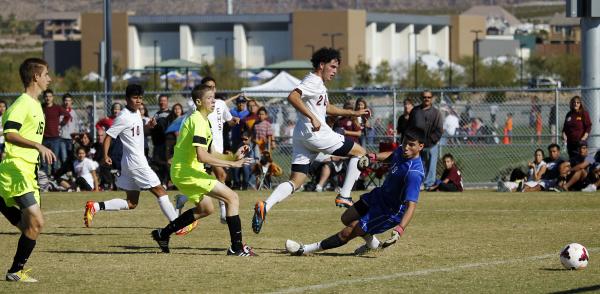 Eldorado’s Andres Lua (20) watches his shot get past Green Valley goalie Victor Marque ...