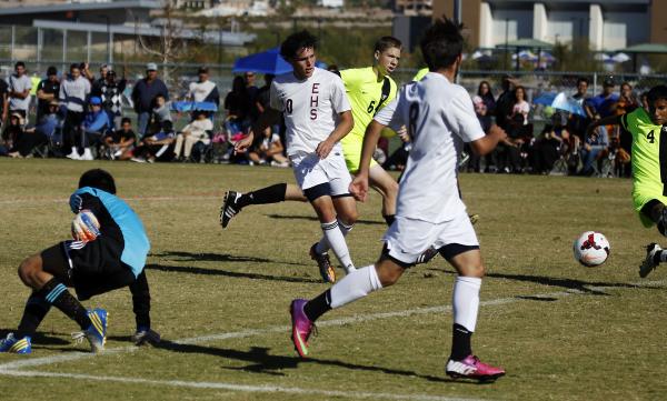 Eldorado’s Andres Lua (20) shoots into an open net for a score as Green Valley goalie ...