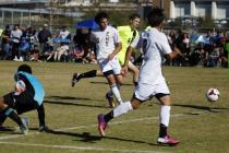 Eldorado’s Andres Lua (20) shoots into an open net for a score as Green Valley goalie ...